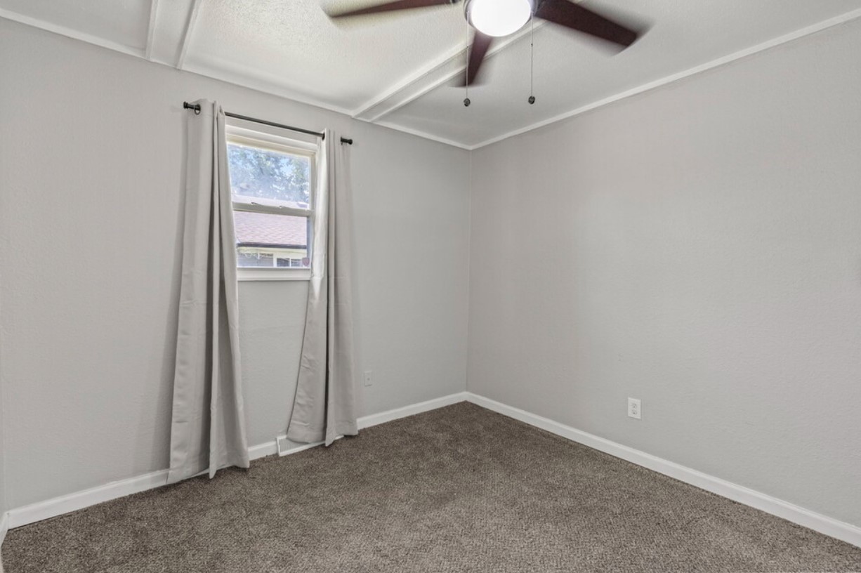 bedroom looking at windows